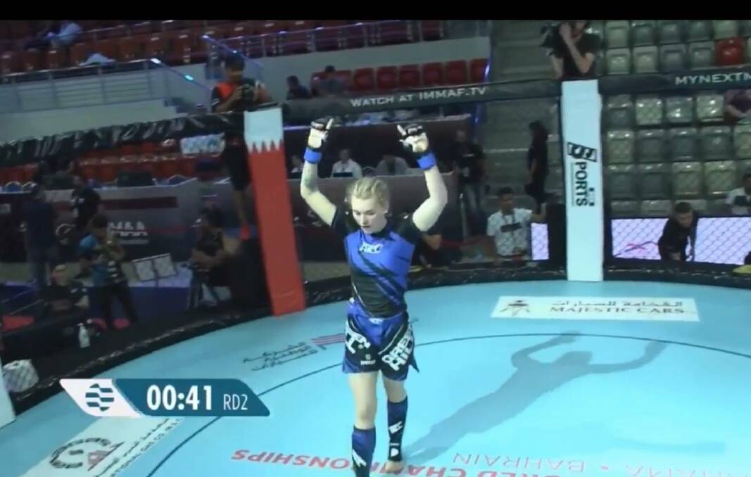 Victorious: Koroit's Alish Smith celebrates after winning her opening fight.