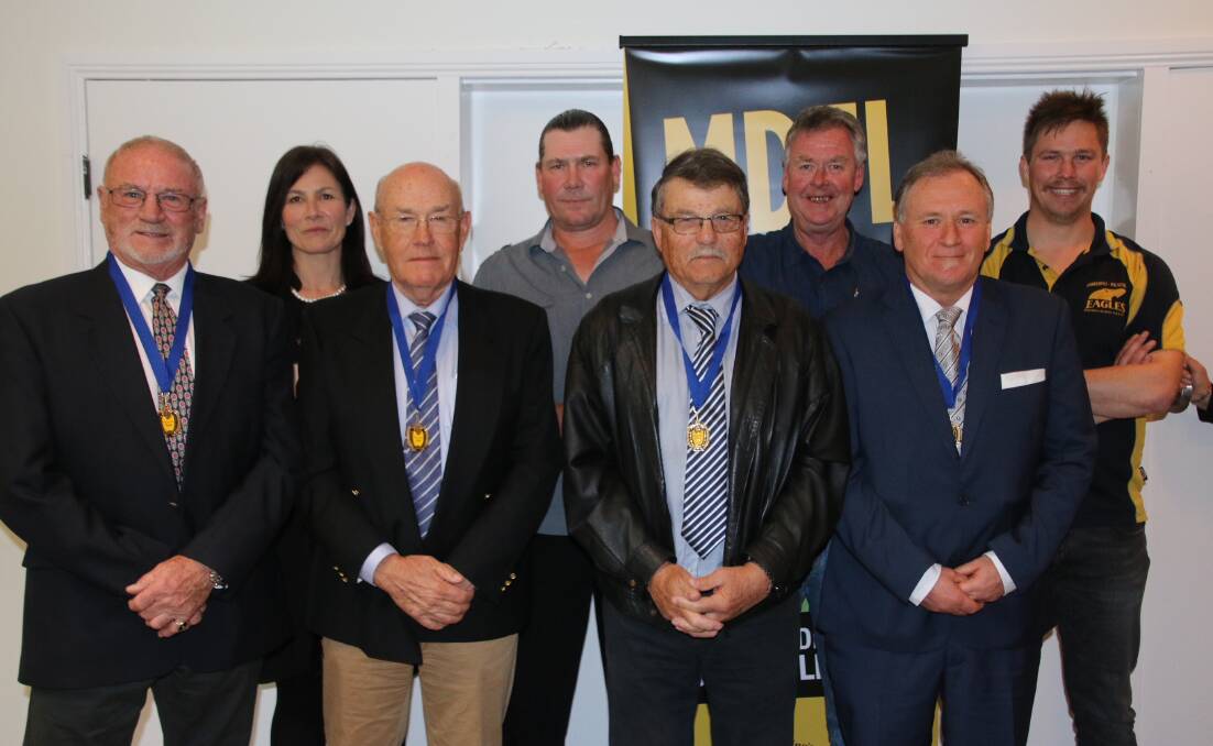 Special moment: The retrospective medal recipients or their representatives at the Mininera and District league's presentation night. Picture: Tracey Kruger