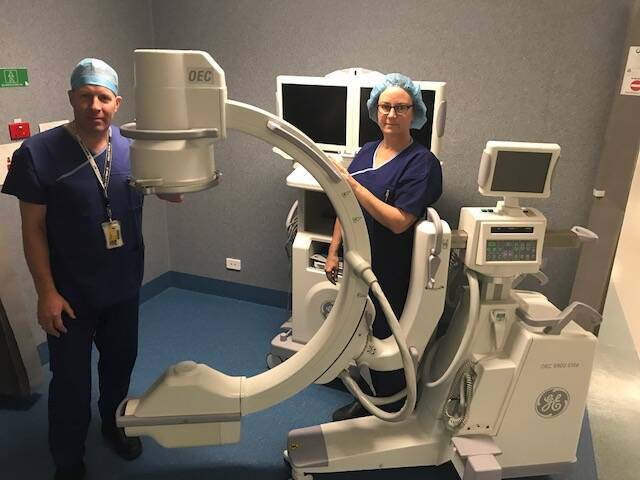 Vision: Orthopaedic surgeon Mr Alasdair Sutherland and operating unit manager Joanne Canny are hoping fundraising events such as Deb Arnott's fashion parade will help the hospital achieve its goal of obtaing a second portable x-ray machine.
