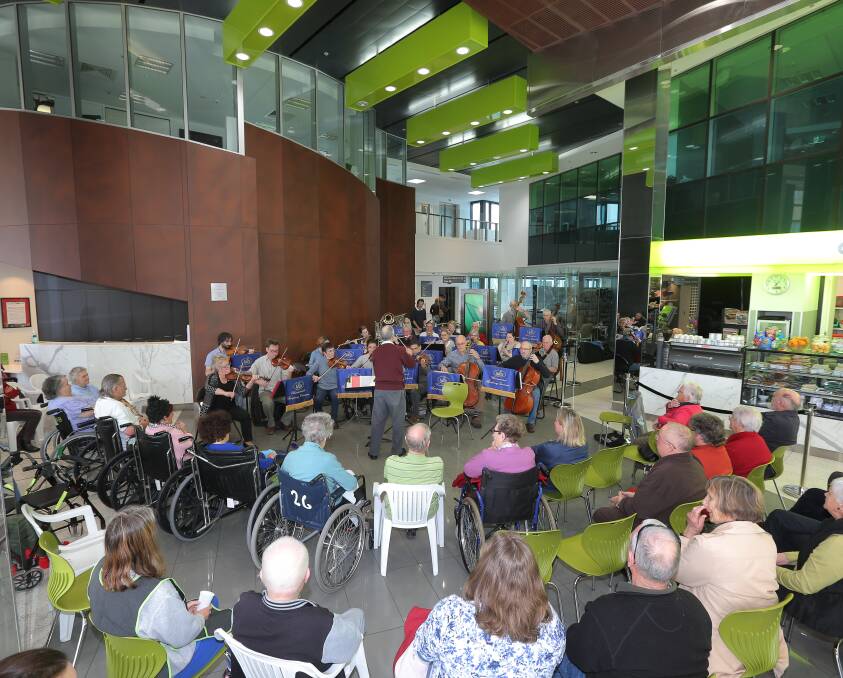 Soothing sounds: Patients, family and friends were entertained by the Warrnambool Symphony Orchestra at the Warrnambool Base Hospital on Saturday. Picture: Vicky Hughson.