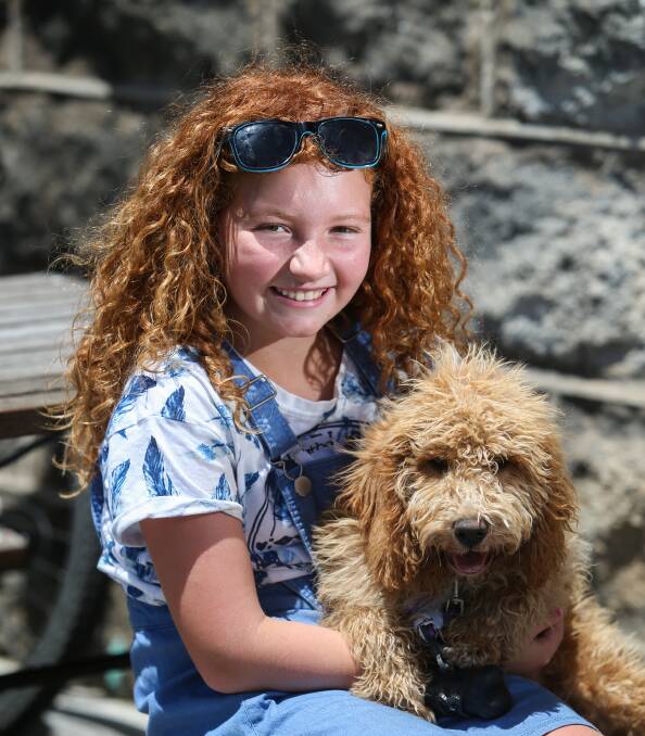 Port Fairy's Evie Dalton, 11, and her golden labradoodle Agatha Primrose won 'Dog who looks most like owner' at Moyneyana Pet Appreciation Day. Picture: Amy Paton