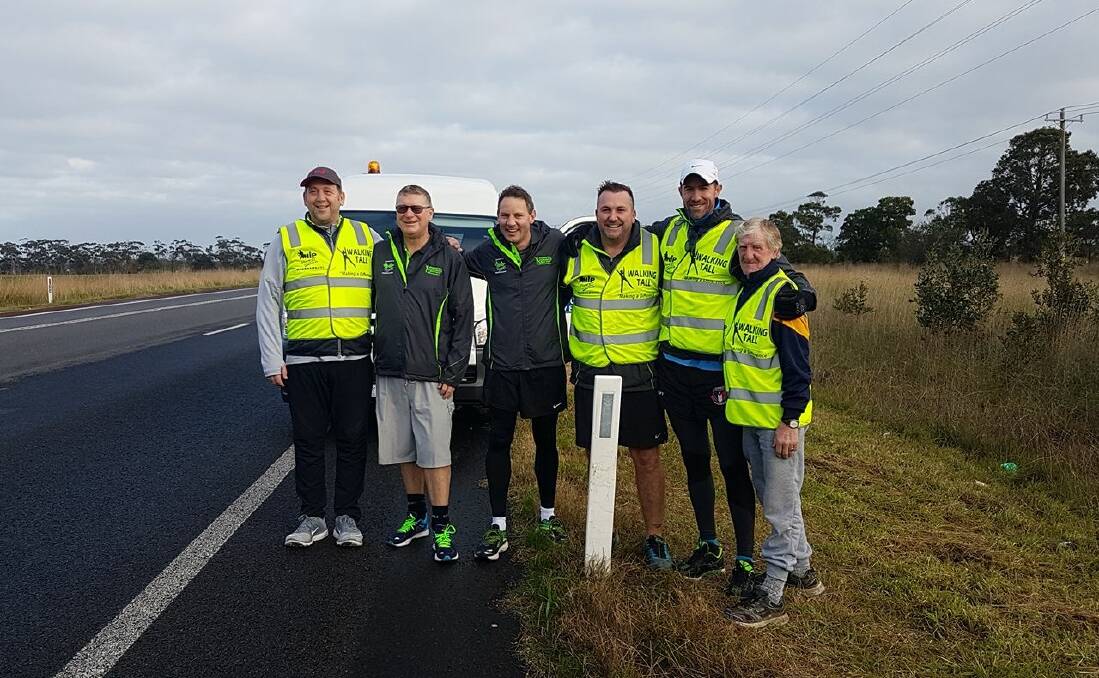 Walking Tall: Terang residents Jack Crawley and Radish Drever were showing their support for Standing Tall walkers at the half-way mark of the 200km campaign.