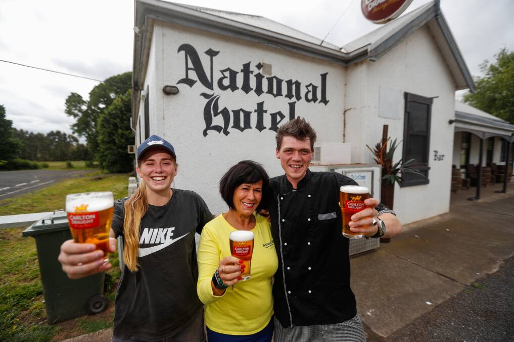 Drink up: Woolsthorpe National Hotel staff and patrons Kelsey Perry, Michelle Guyett-McQuilton and Sam Grey are revelling in their new state-wide award as the home of Victoria's best pot pourer. Picture: Morgan Hancock.