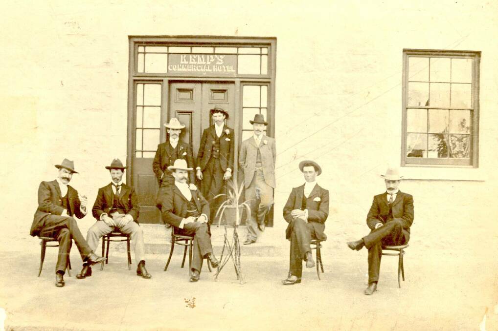 Cheers: Chaps dressed in their finest posed for a photograph at the front of the hotel sometime between 1889 and 1892. Picture: PF Historical Society.