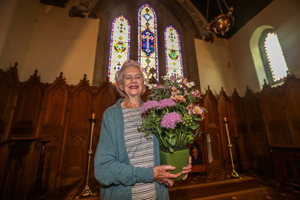 Full bloom: Port Fairy's Margaret Lawrence has been making space within St John's Anglican Church for the Festival of Flowers this weekend. Picture: Anthony Brady