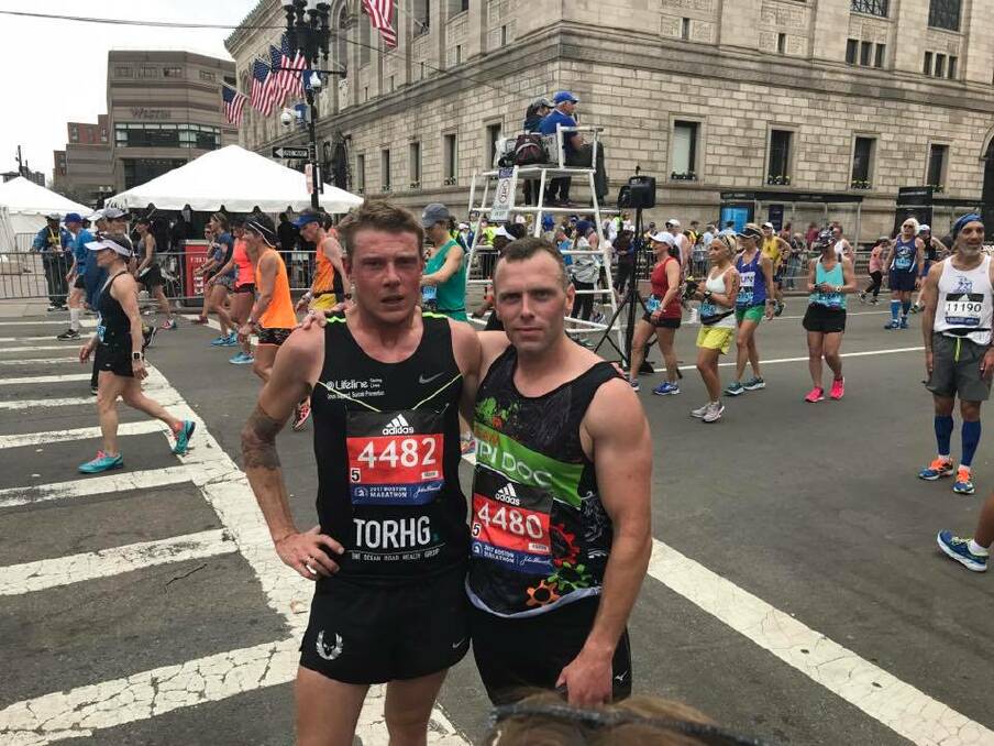 Spent: Warrnambool running enthusiast Ashley Ansell and friend and fellow-runner Scott Rantall competed in this year's Boston Marathon.