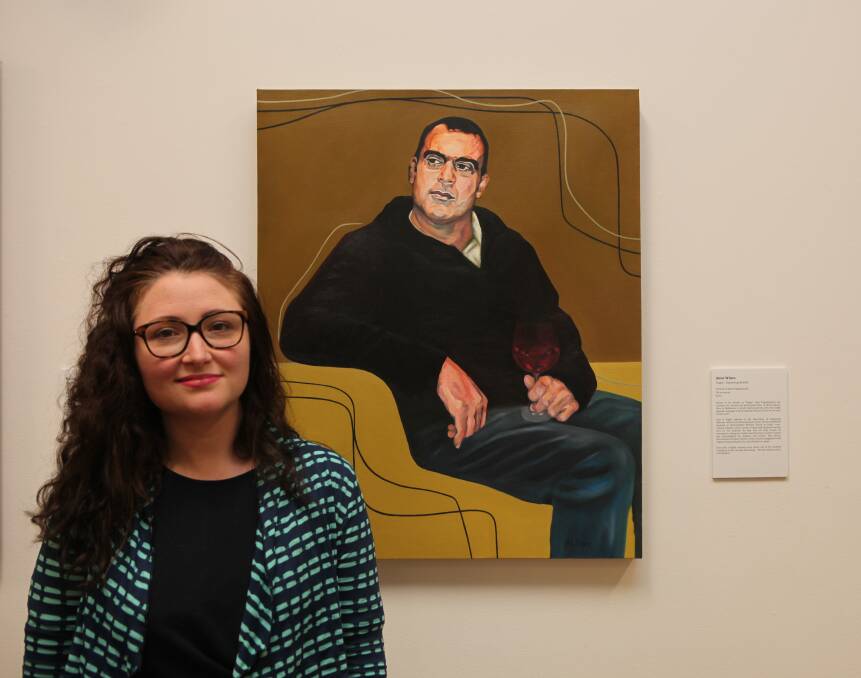 Winner: Warrnambool Art Gallery director Vanessa Gerrans stands by the 2017 Warrnibald people's choice award winning entry of John Papadopoulos entitled 'Pappa - Exploring identity' by Anne Wines. Picture: Rebecca Riddle