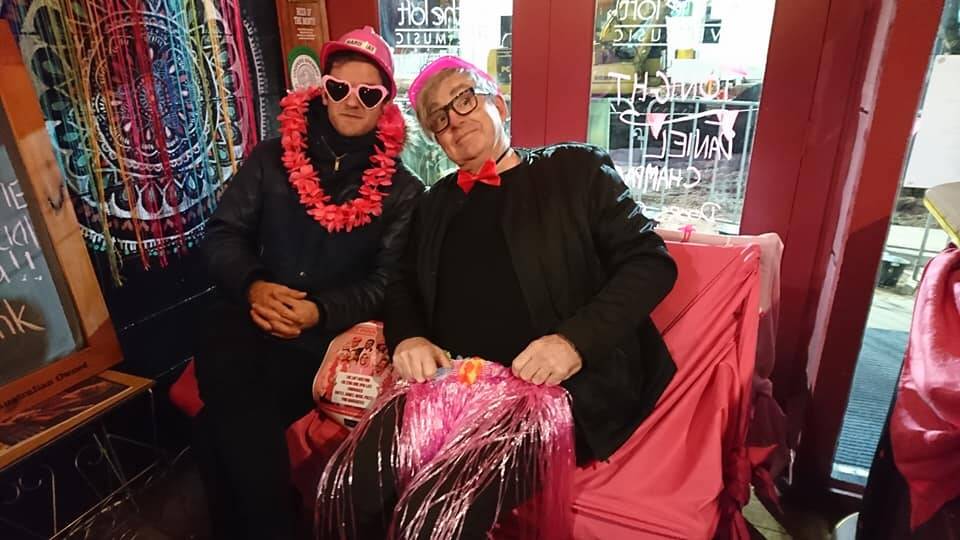 Pinkalicious: Warrnambool musician Daniel Champagne and photographer David Harris get in the pink for The Loft's fundraising event for the National Breast Cancer Foundation on Friday. 