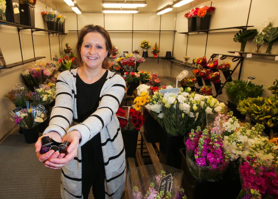 Making scents: Warrnambool Fresh Flower Market florist Lisa Kelson is encouraging coffee-drinkers in the community to recycle their used capsules and avoid landfill. Picture: Morgan Hancock.
