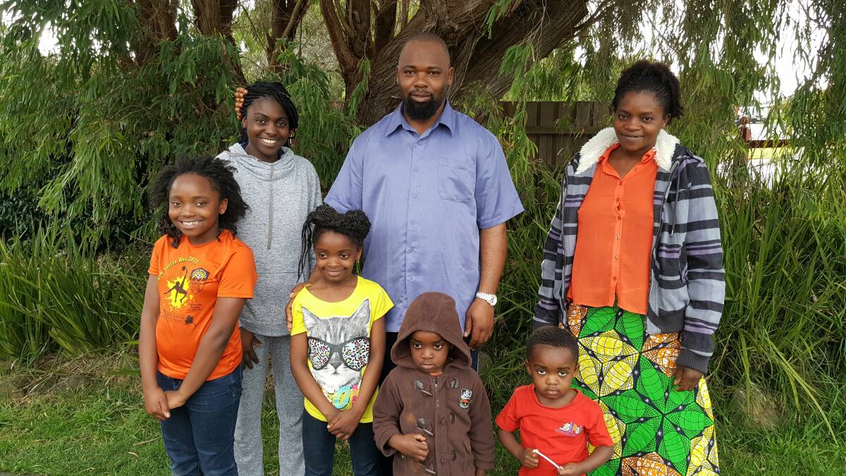 New home: Warrnambool family Jolie Kaninda, 9, Bella Mpoyo, 17, Flora Kaninda, 7, Kaninda Bijimba, his wife Aimiee Kazadi and sons Peter Kaninda, 3 and Chance Kaninda, 2, say they have been blessed with a new start. 