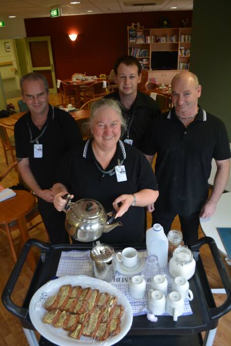 At your service: Warrnambool trainees David Stevenson, Evelyn Habel, Jonathan Honeyman and Stephen Dennis are serving up treats with a smile at Lyndoch.