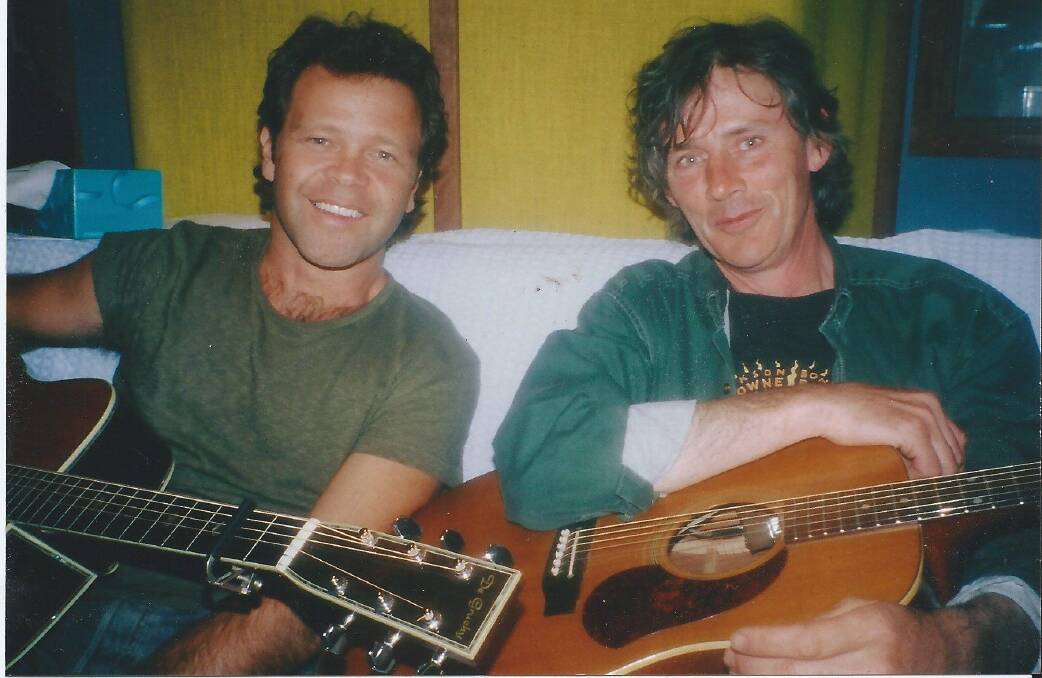 Pair: Musicians Troy Cassar Daley and Shane Howard are reuniting to share stories and songs at Crossley's St Brigids Church on the weekend. Pictured here in 2003.