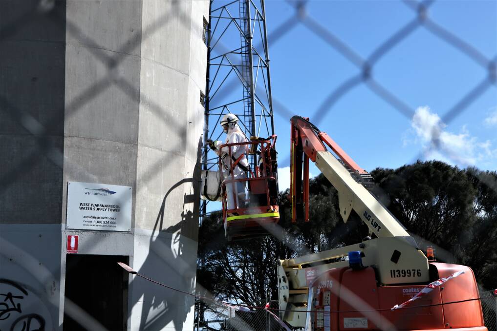 Prep: Workers from Melbourne-based company Absafe are being kept busy conducting necessary revitalisation work to the exterior of Wannon Water's Warrnambool West water supply tower. Picture: Anthony Brady.