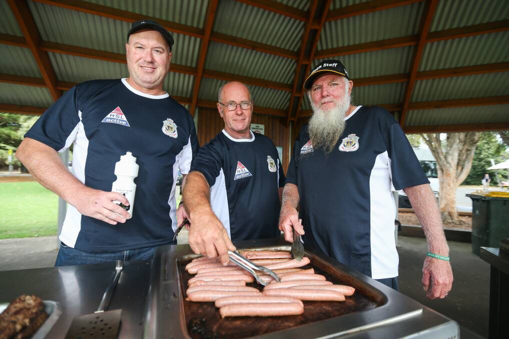 Barbecue battle: Former defence force cooks Rodney Symons (Army), Les Green (Navy) and Peter Croft (Air Force) battled for the honour of top spot at the Walking off the War Within event on Sunday.  Picture: Morgan Hancock