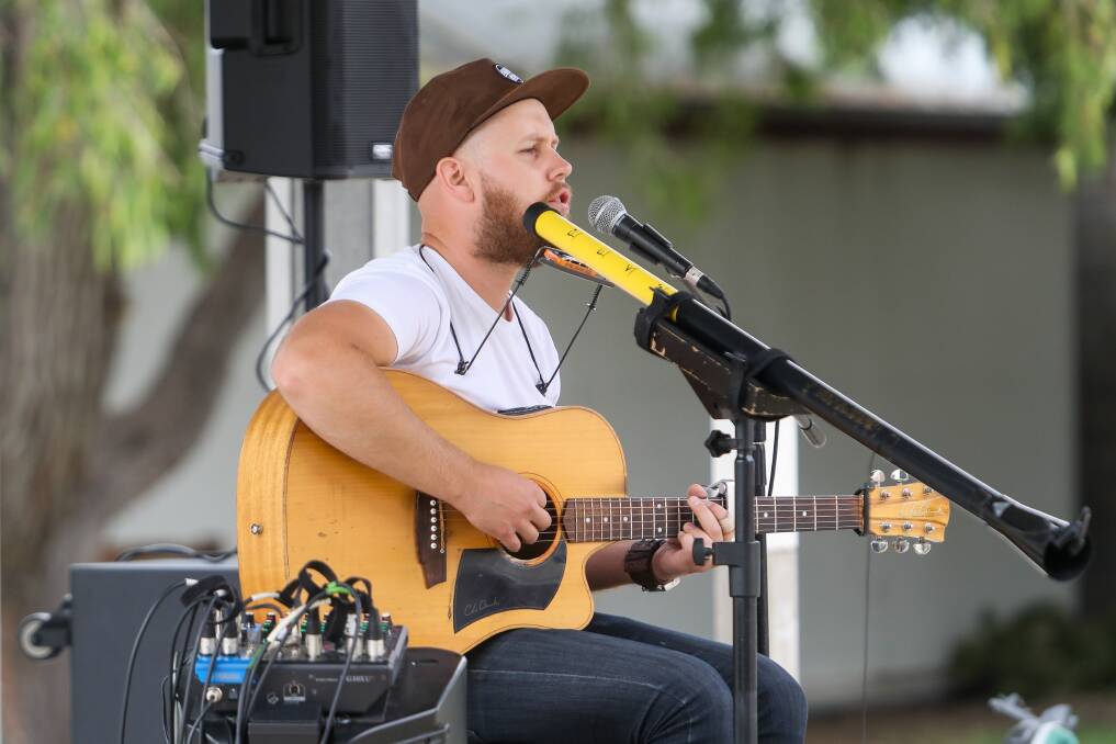 Tunes: Rhys Crimmins performed on the Fiddlers Green on Tuesday as part of the 2019 Moyneyana program. The talented musician returns to the south-west after releasing his album in March during the Folk Festival.