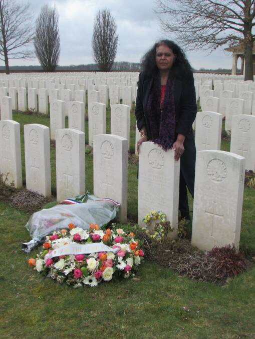 Emotional journey: Fiona Clarke at the grave of her great uncle Reg Rawlings at Heath cemetery, Harbonnieres, France.