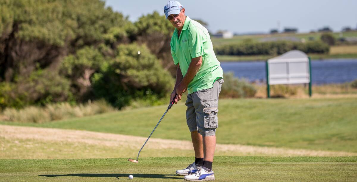 In the money: Club captain Graham King in action on the 8th hole where he picked up $167 in the superpin after an impressive shot to the par three. Picture: Christine Ansorge