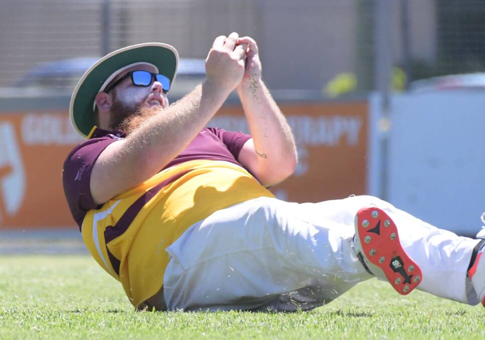 Got him: Dan Boyle takes an important catch for Grassmere Cricket Association's division three side at Bendigo on Tuesday. Picture: Noni Hyett