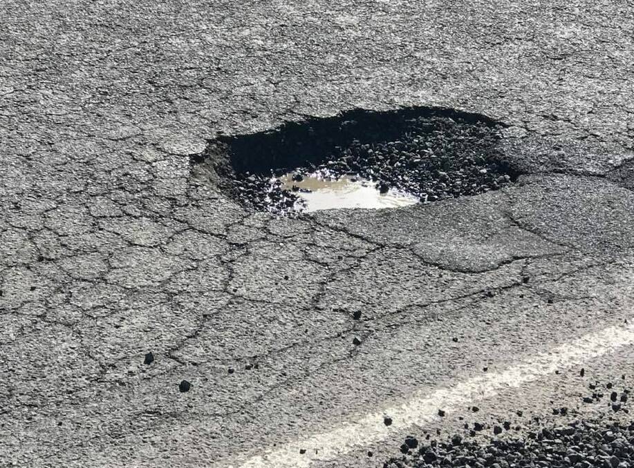 Long, bumpy road to pothole funding