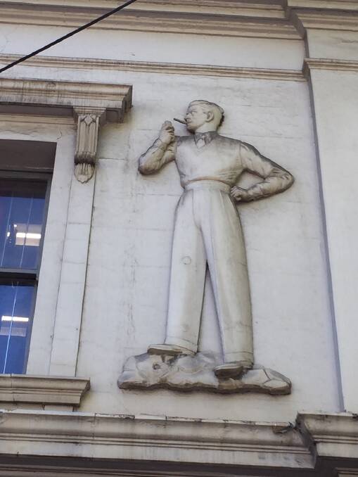 Preserved: This depiction of the Plus 8 Man on a store on the corner of Queen and Flinders streets in Melbourne was used to create the new version for Warrnambool's Fletcher Jones gardens.