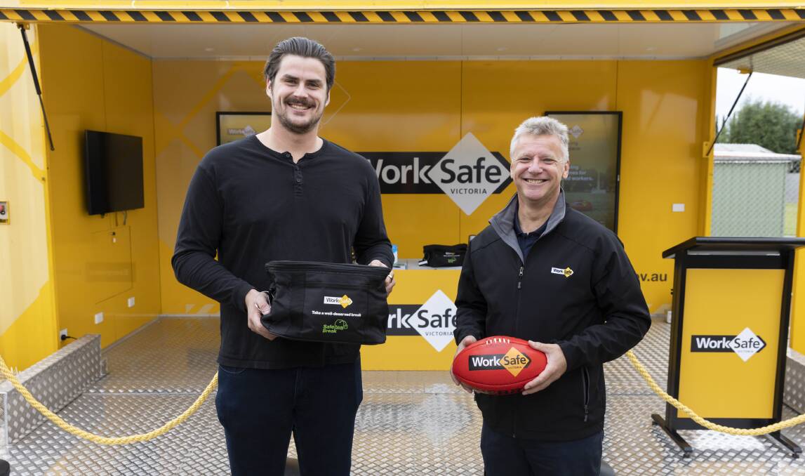 Tom Boyd and Michael Vanderzalm, Senior Inspector at Traralgon, with WorkSafe's safe-tea break pack that encourages farmers to take a well-earned break. 