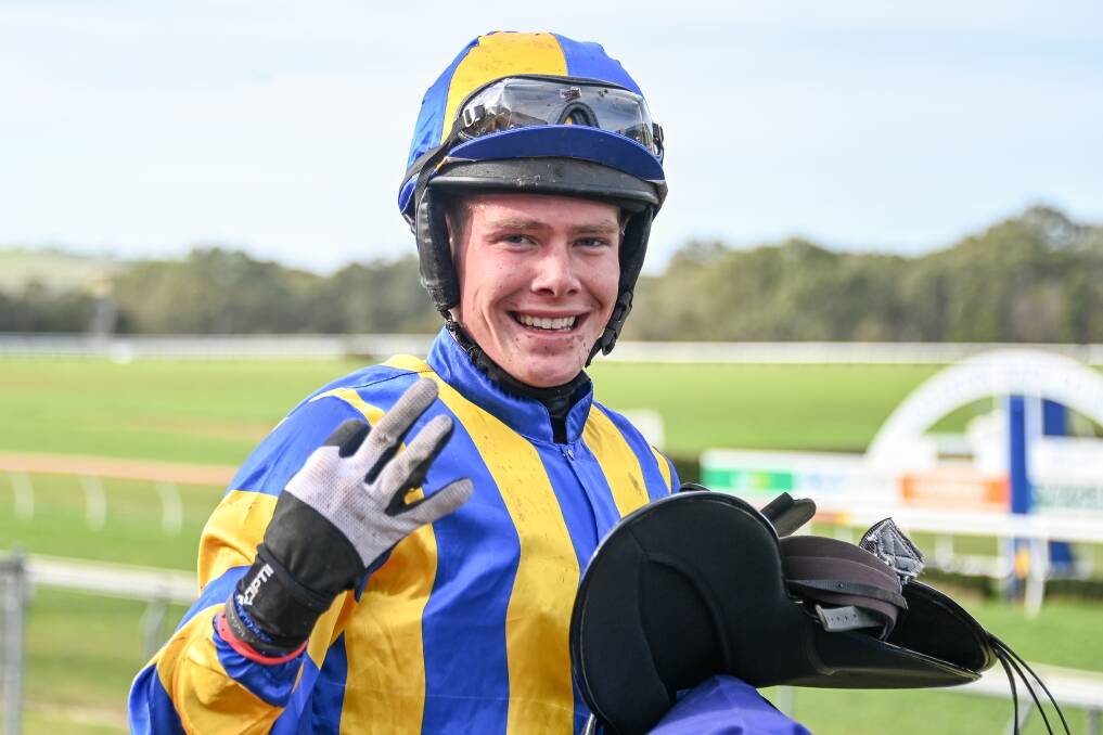 TOP DAY: Ronan Short shows how many winners he had at Casterton on Saturday. Picture: Alice Laidlaw/Racing Photos)