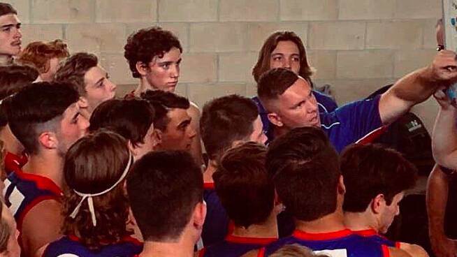 THE TROOP LEADER: Moloney address his players at half-time last year.