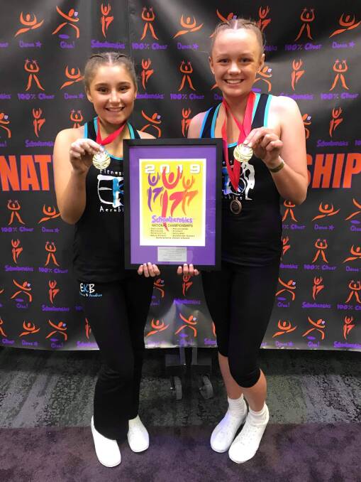 GOLDEN TIMES: Maddison Drake and Brianna Kilpatrick secured victory in the secondary pairs at the School Aerobic and Dance Star Nationals.