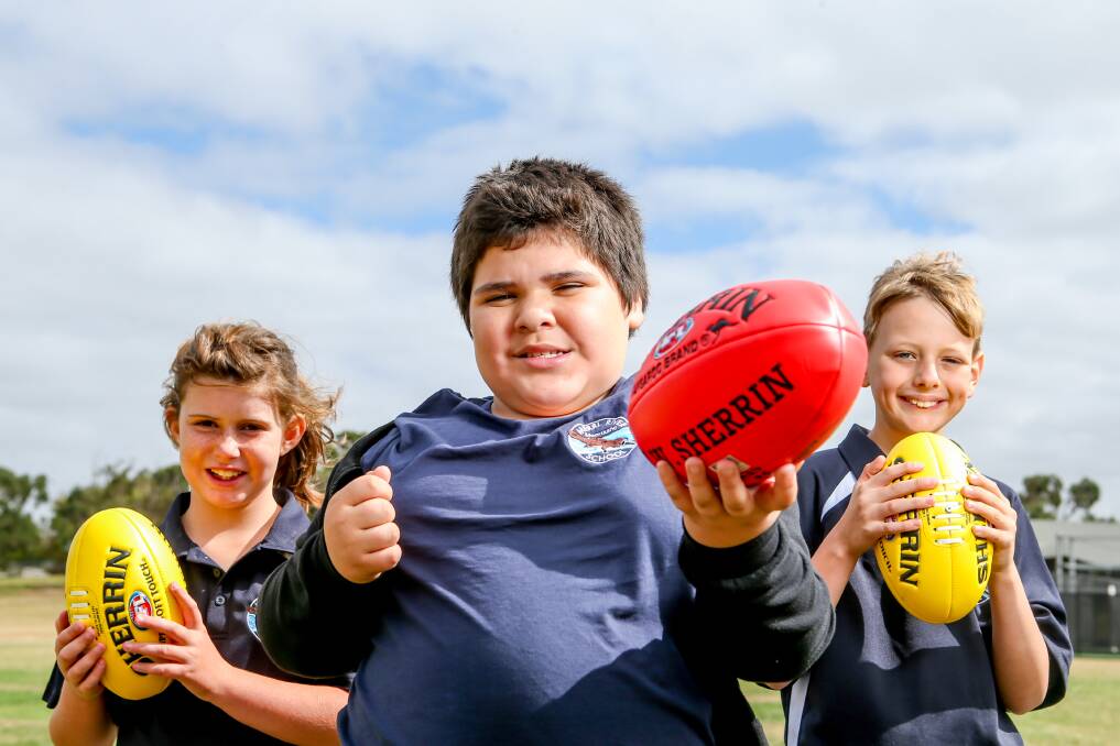 FOR EVERYONE: Merri River School students Taylor Young, Jordan Turner and Devin are excited for the new all-abilities Auskick centre to open at their school. Picture: Chris Doheny