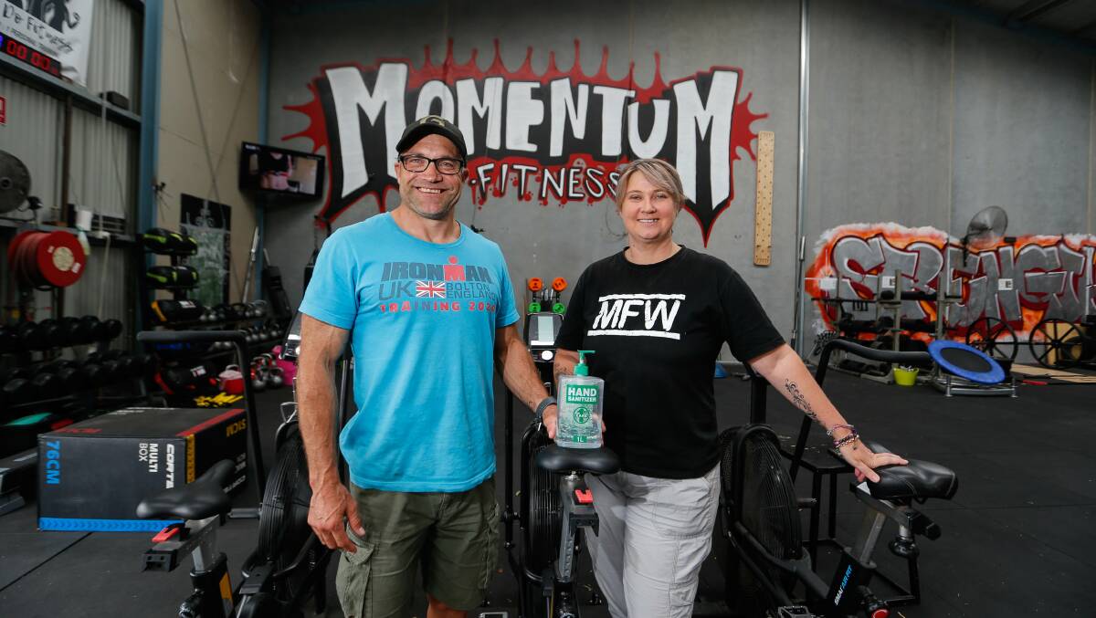 CLEAN LIFTING: Momentum Fitness owners Scott and Kris Sudale at their gym. Picture: Anthony Brady
