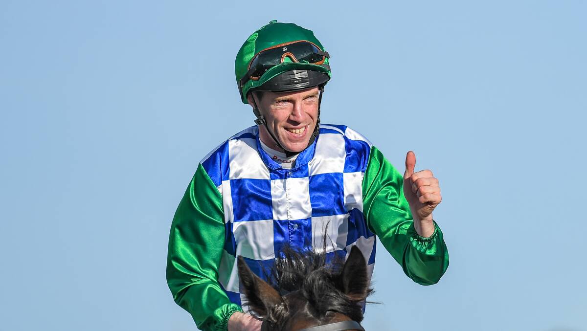 BACK-TO-BACK: John Allen gives a thumbs up after riding Furrion to victory in the Warrnambool Cup. Picture: Alice Laidlaw/Racing Photos