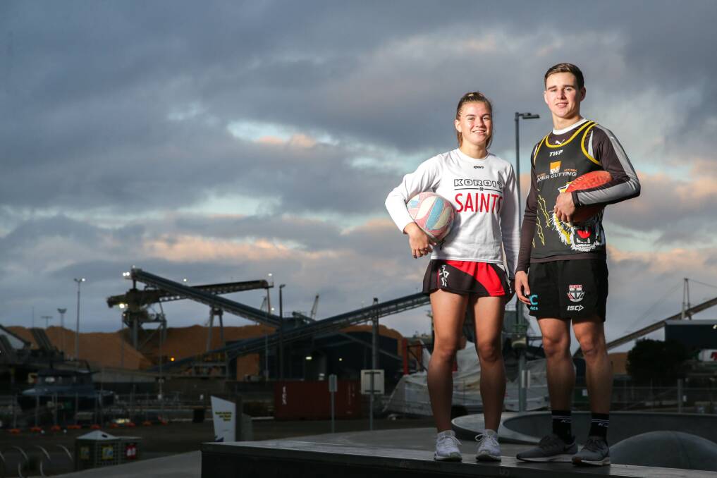 WORKING HARD: Western Region Netball Academy player Millie Jennings, picture with her brother Toby, has improved her ball skills and fitness. Picture: Chris Doheny