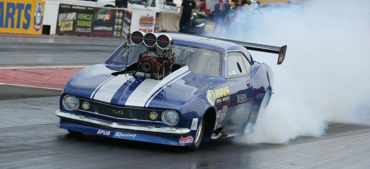 LETTING RIP: Justin Russell warms up his tyres on his 1967 SS Camaro before a race last season. Picture: Outlaw Images
