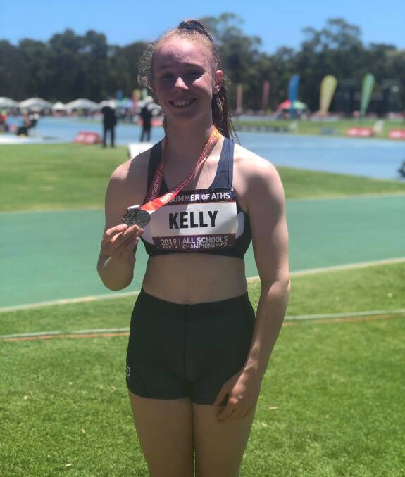MEDAL JOY: Grace Kelly is all smiles after claiming a silver in the 100 metres at the Australian All-Schools Championships in Perth. Picture: Kev Kelly