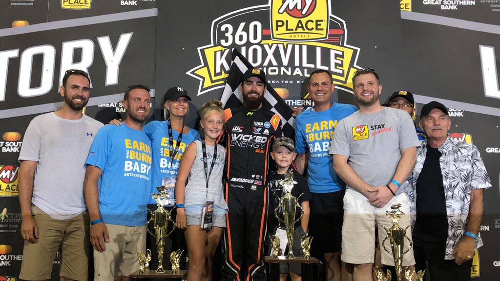 WINNING TEAM: James McFadden stands on the podium with his Wicked Energy Gum team after claiming victory at the Knoxville 360 Nationals. Picture: Knoxville Raceway