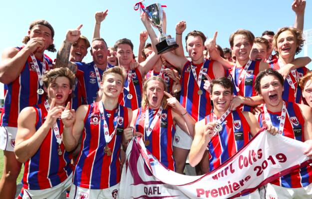 PREMIERS: Brent Moloney celebrates Wilston Grange colts' (under 18) 2019 QAFL grand final win with his players, his first flag as a coach.