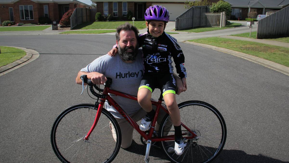 FAMILY SPORT: Andy Graham passed on his cycling passion to his daughter Asha. Picture: Sean Hardeman