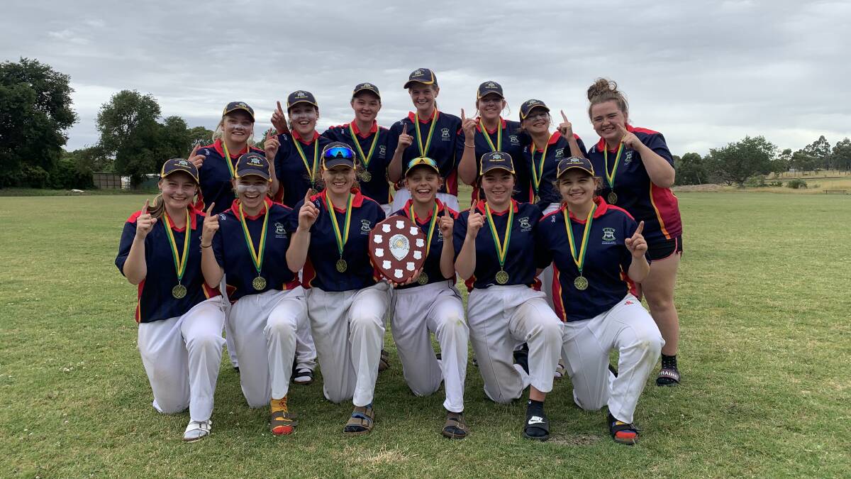 CHAMPIONS: The Warrnambool and District Cricket Association's under 16 girls side celebrate winning the Western Victoria Girls Shield.