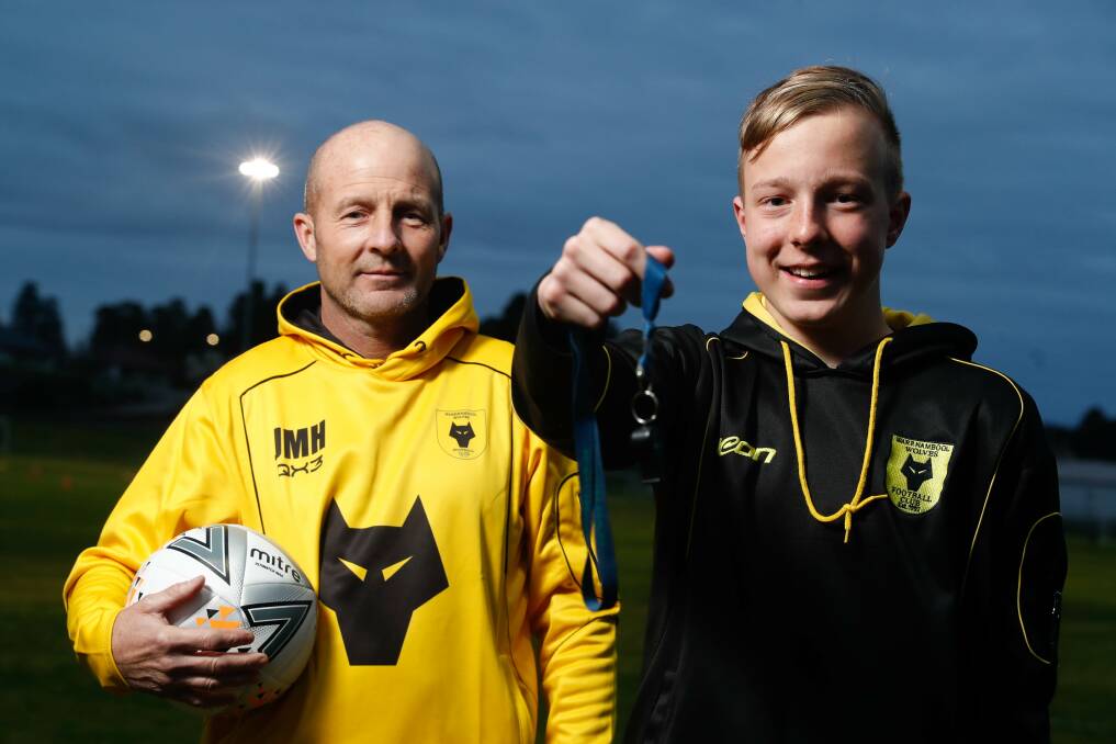 UNDER CONTROL: Ollie Morland-Hunt (right) was inspired by his father Jeff to take up refereeing and has come through the Wolves' program. Picture: Chris Doheny