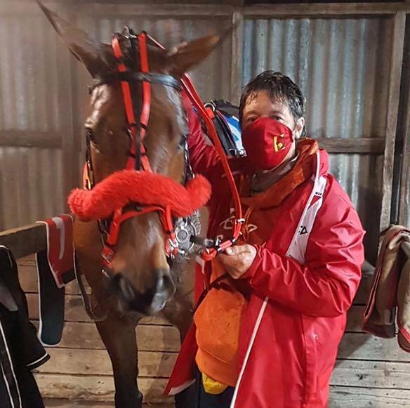 IN THE STALLS: Marg Lee with Keayang Livana after her victory. Picture: Terang Harness Racing Club/Facebook