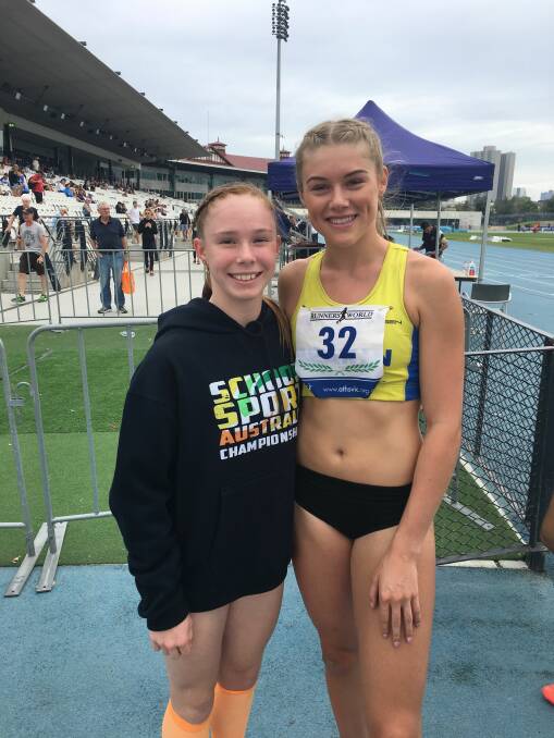 IDOL: Grace Kelly poses with national runner Mia Gross at the state titles over the weekend. Picture: Supplied