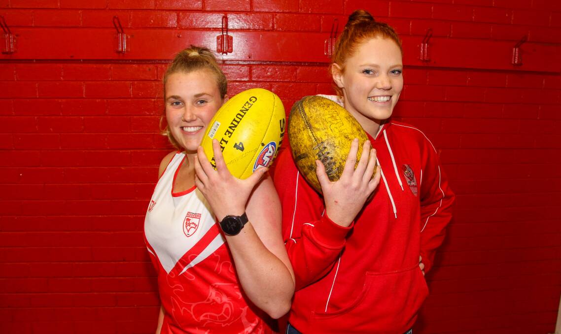 THEIR GAME: South Warrnambool players Eve Auslebrook and Micah Drake are making the most of playing footy. Picture: Sean Hardeman