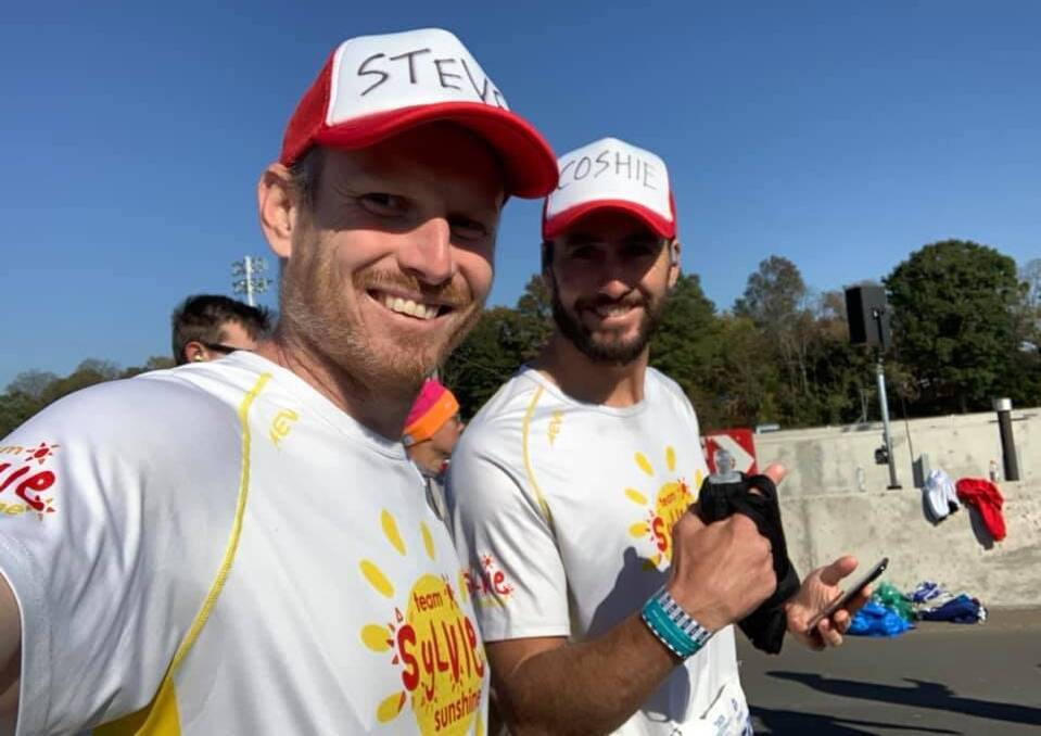 TEAM SYLVIE: Steve Watty and Adam McCosh prepare to run the marathon. 