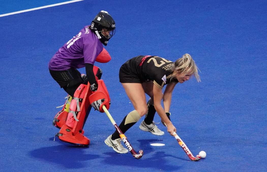 SO CLOSE: Madi Ratcliffe and her Hockey Club Melbourne teammates fell just short in the grand final. Picture: AAP