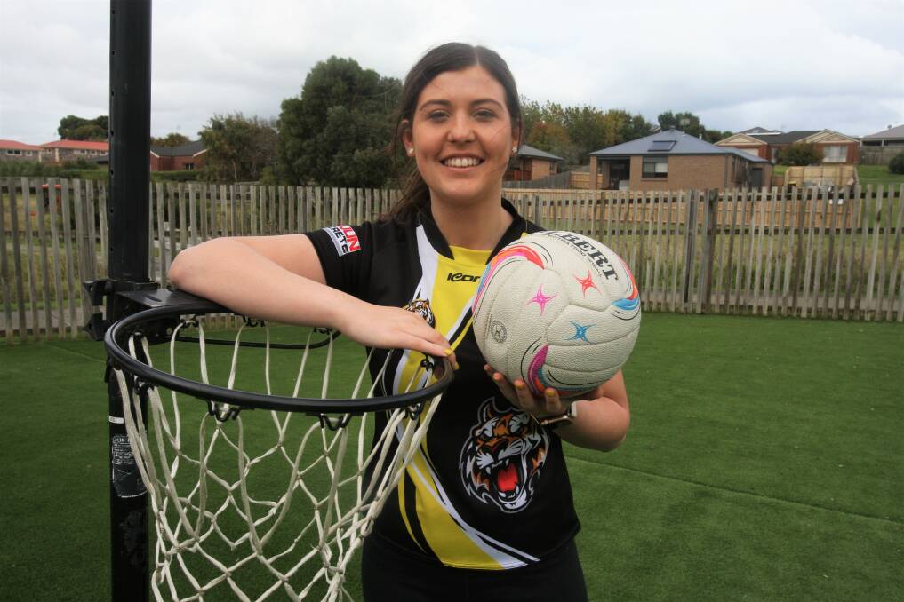 KNACK FOR GOALS: Merrivale's Chloe Lovell, pictured at her work at Goodstart Early Learning Warrnambool, has scored 48 goals in two rounds. Picture: Sean Hardeman