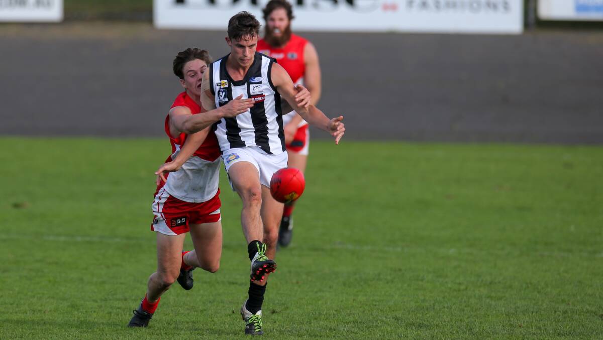 OPPONENTS TO MATES: Charlie Bradshaw is tackled by Jock Blair in 2017. The pair later became teammates at South Warrnambool.