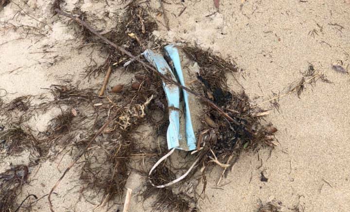 WASHING UP: Single-use masks have already started to appear on Warrnambool beaches. Picture: Mia Easton/Facebook