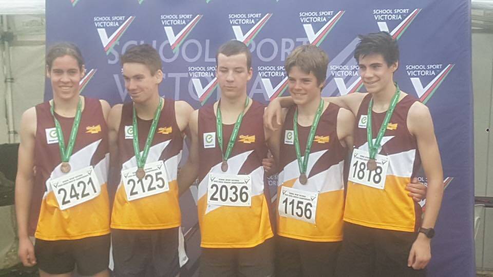NEW BLING: Timboon P-12 under 16 boys team of Logan Cuthell, Lachie Berry, Robbie Gleeson, Kobe Henderson and Ben Matthews pose with their state cross country bronze medals. Picture: Timboon P-12