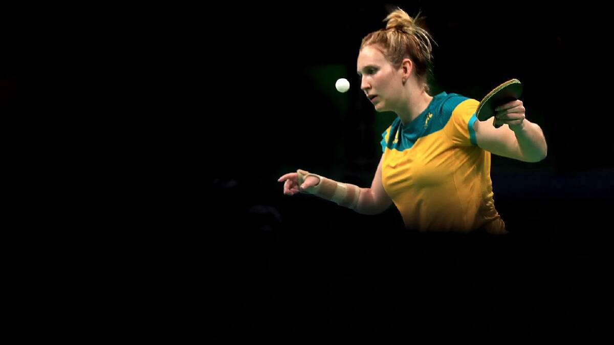 IN THE ZONE: Melissa Tapper serves the ball at one of her Olympic appearances. 
