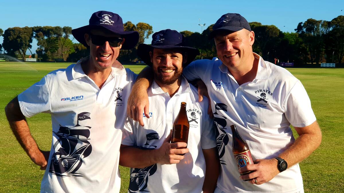 LAST DRINKS: Steve Dwyer, captain Aaron Williams and Darren Lloyd celebrate together after the club's final match of the season.